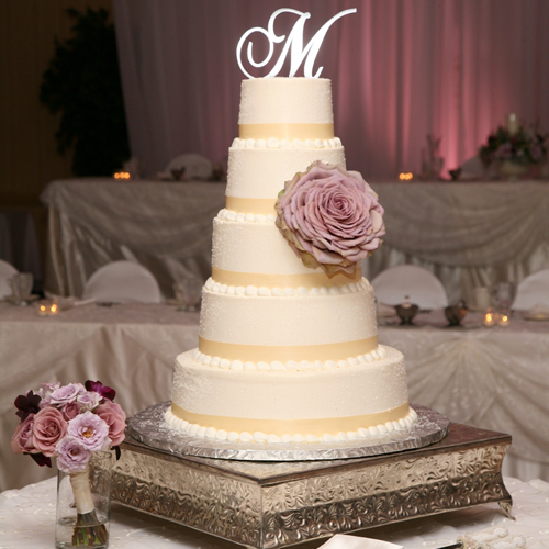 cake by the French Confection adorned by an Amnesia composite rose from Floral Verde LLC