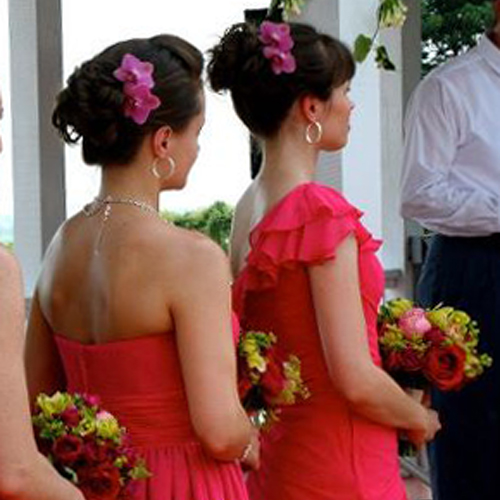 bridesmaids wearing Pink Phalaenopsis orchid hair combs